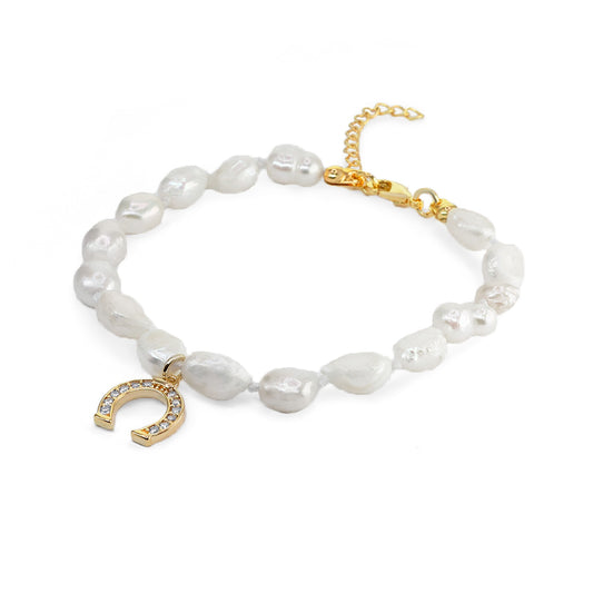 Pulsera Enchapado en Oro Perlas con Herradura de Circones